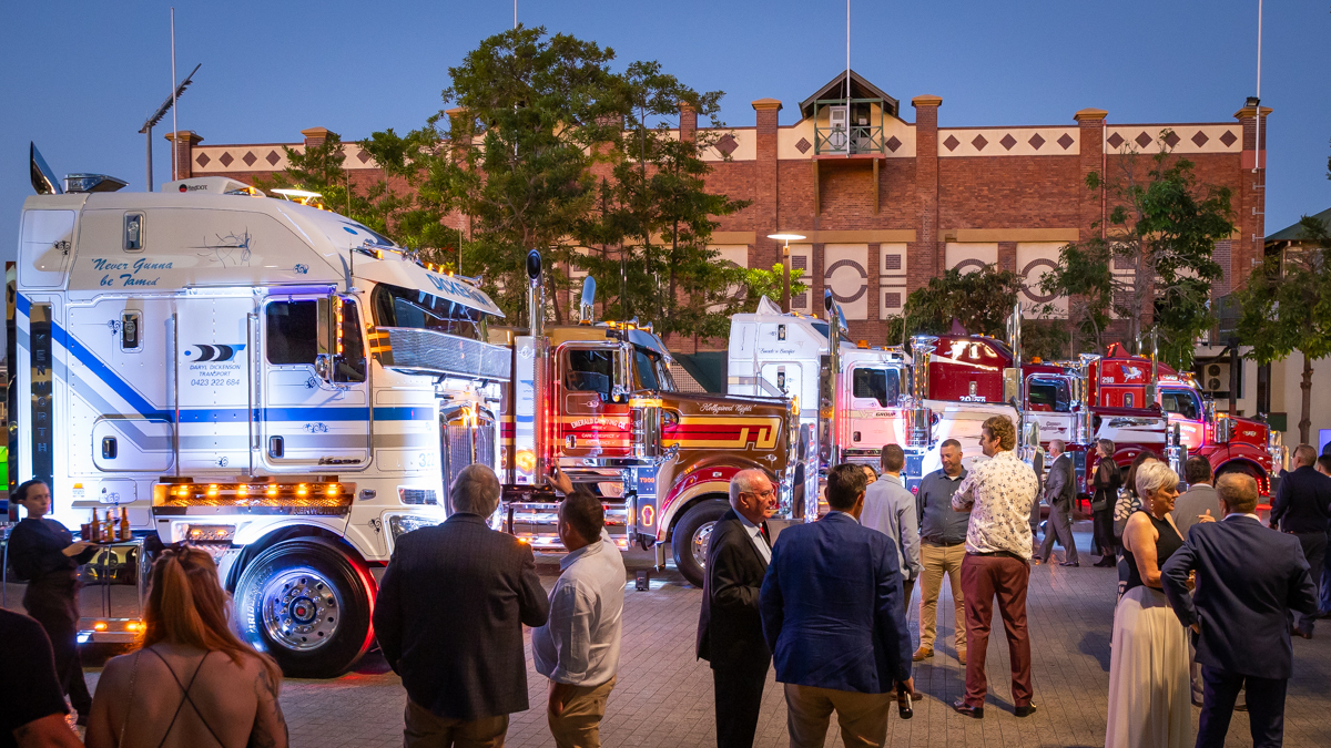 QTA RFIA Plaza Truck Lineup with people